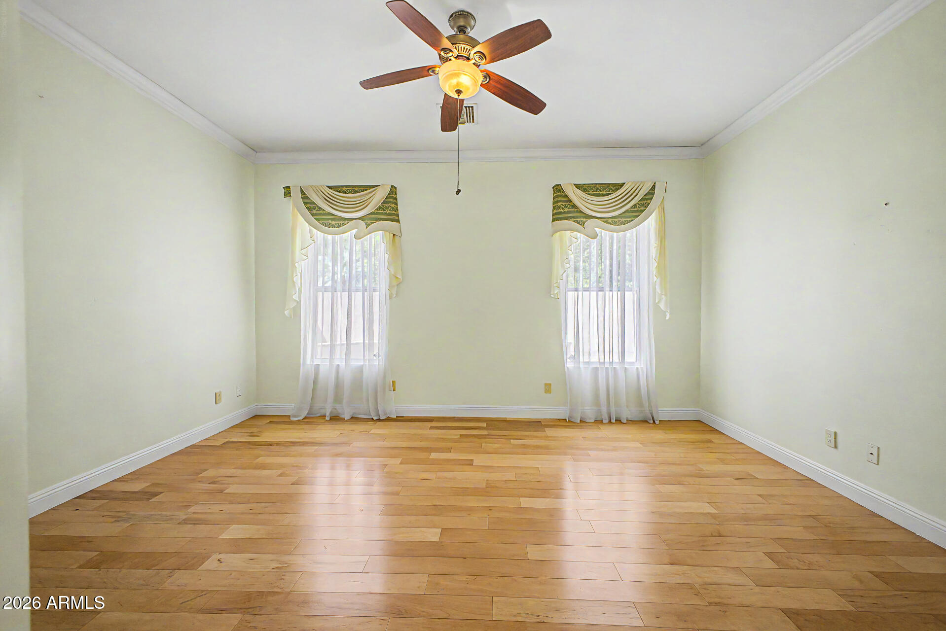 808 West Citrus Way Phoenix, AZ 85013 - Photo 14 of 35 wooden floor in an empty room with a window