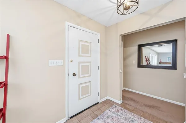 a view of a hallway with closet