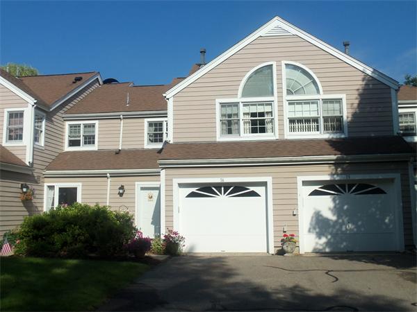 16 Canvasback Way, Unit 16 Walpole, MA 02081 - Photo 1 of 30 a front view of a house