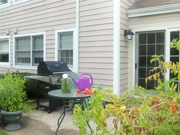 16 Canvasback Way, Unit 16 Walpole, MA 02081 - Photo 23 of 30 a front view of a house with patio