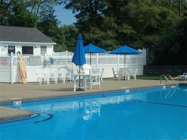 16 Canvasback Way, Unit 16 Walpole, MA 02081 - Photo 27 of 30 a swimming pool view with a outdoor seating
