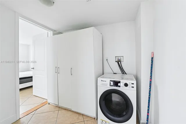 a bathroom with a sink a toilet and bathtub