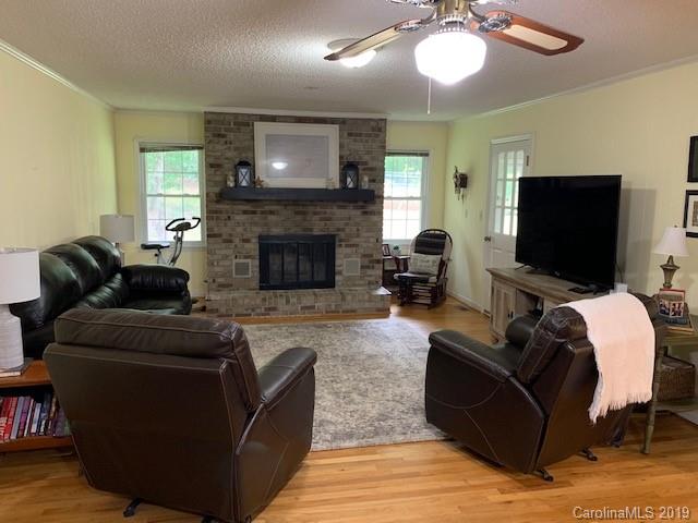 319 Happy Valley Road Union, SC 29379 - Photo 4 of 6 a living room with furniture and a flat screen tv