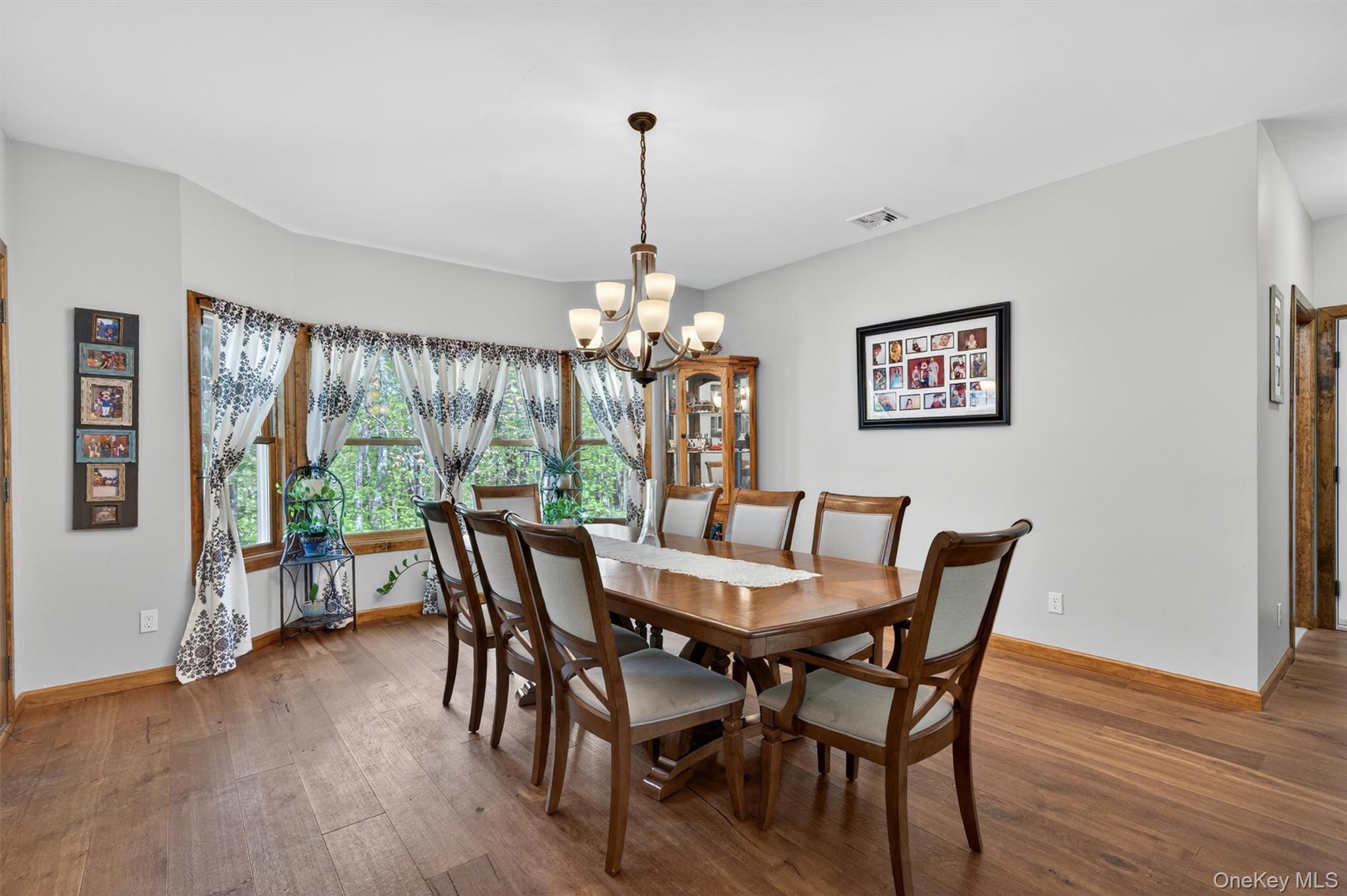 2 White Horse Road Middletown, NY 10940 - Photo 12 of 47 Adjacent to the living room is the formal dining room. Large and inviting, this room is built for large parties and punctuated by a cheerful bay window at one end.