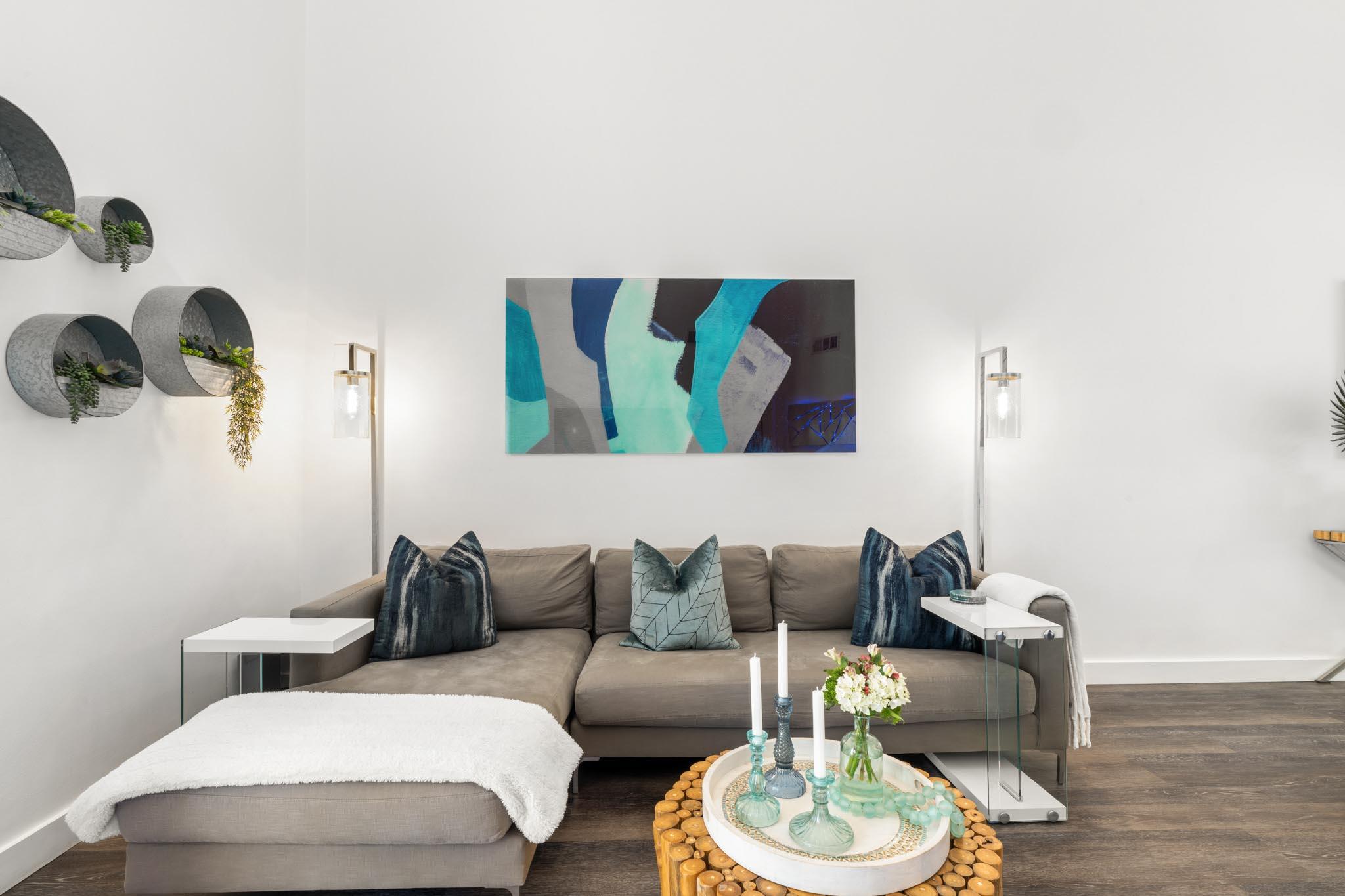 130 Durango Road, Unit 104 Destin, FL 32541 - Photo 16 of 46 a living room with furniture and a wooden floor