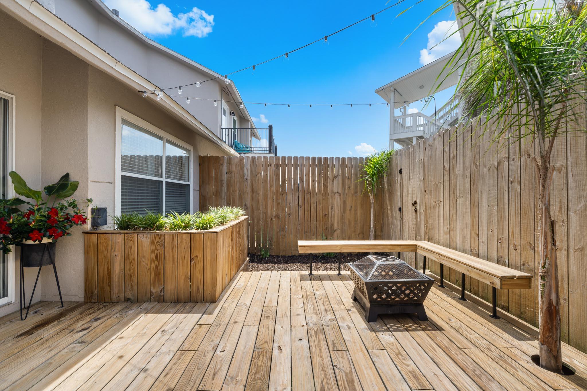 130 Durango Road, Unit 104 Destin, FL 32541 - Photo 20 of 46 a view of balcony with wooden floor and outdoor seating