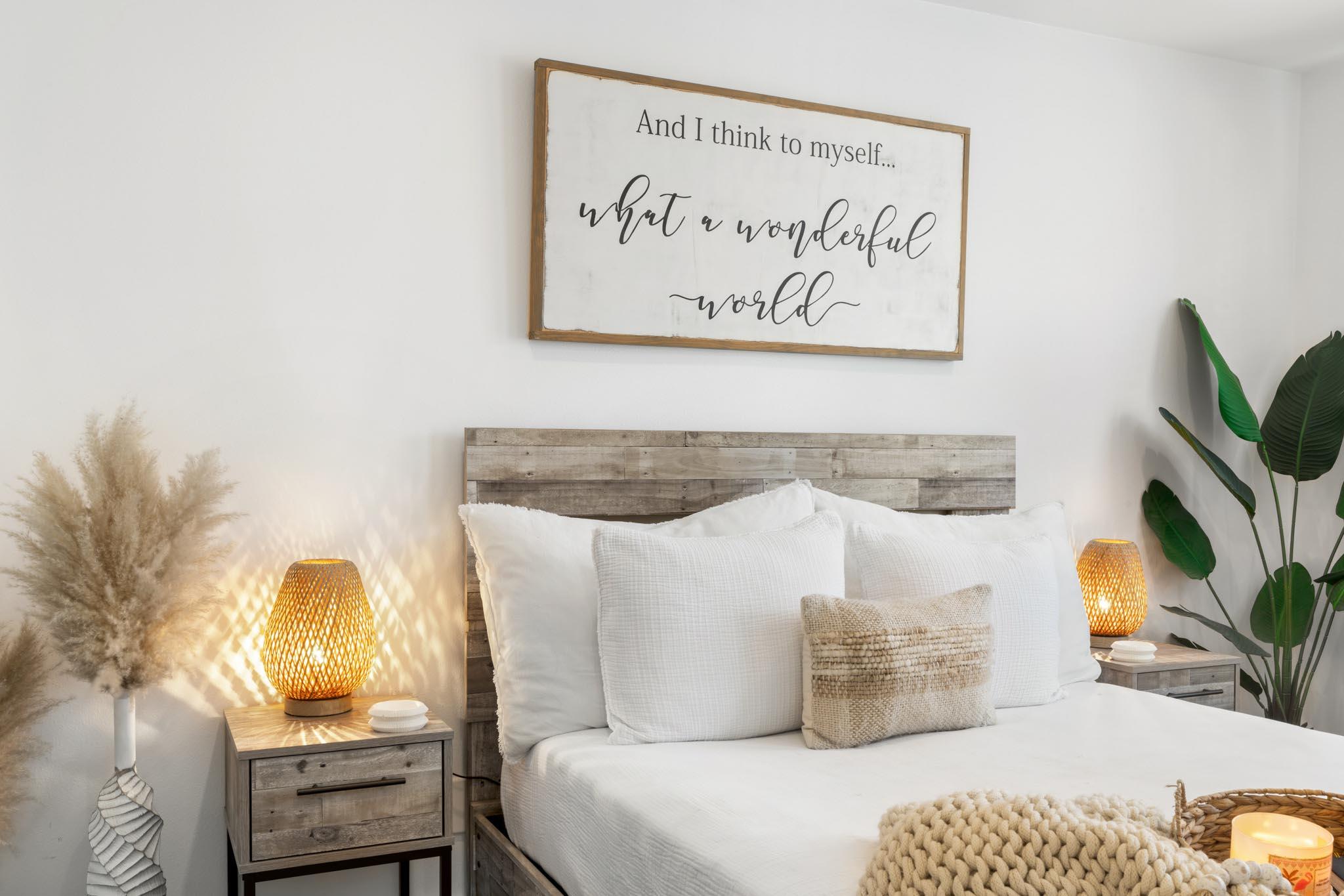 130 Durango Road, Unit 104 Destin, FL 32541 - Photo 26 of 46 a bedroom with a bed and flat screen tv