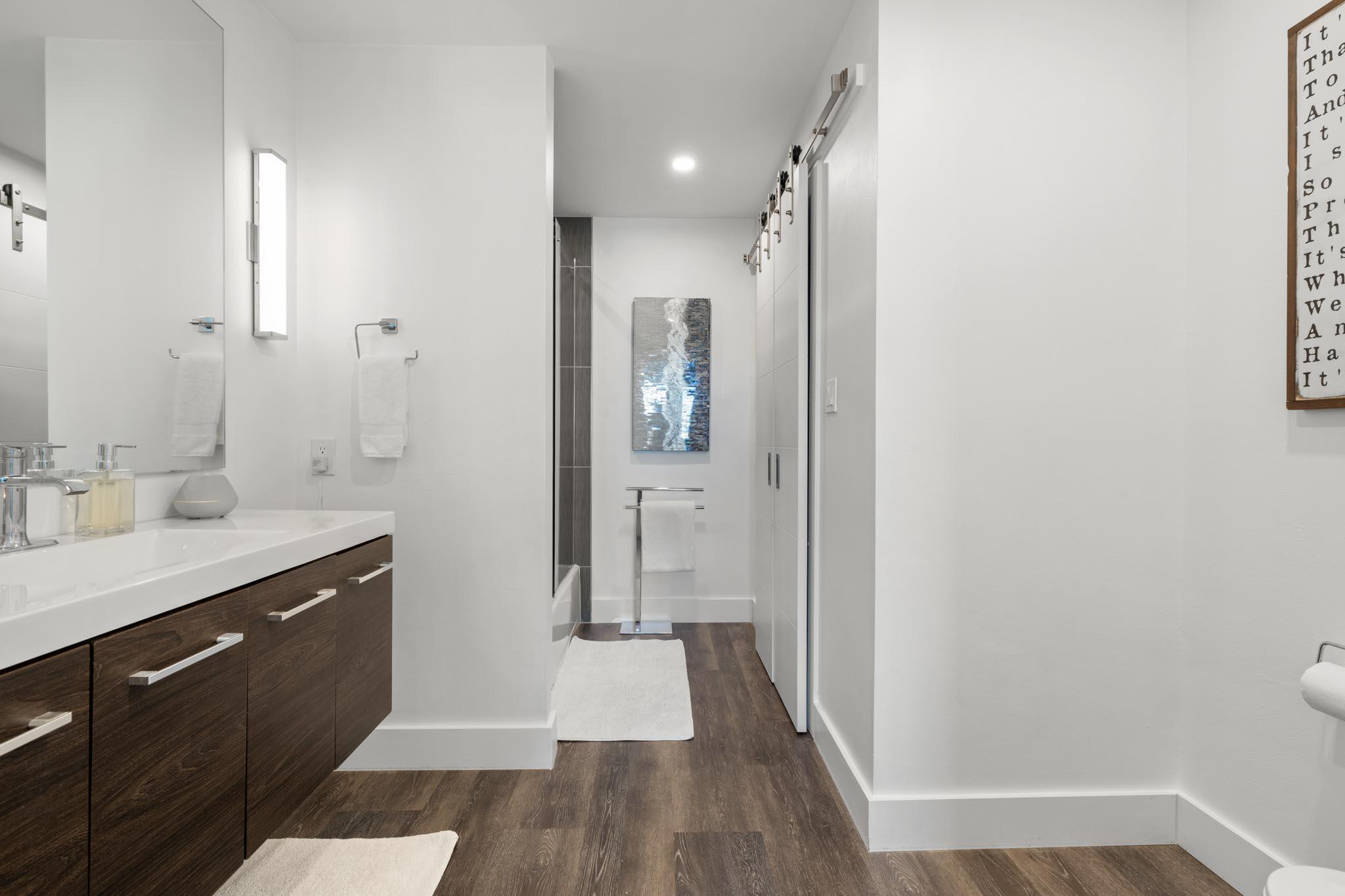 130 Durango Road, Unit 104 Destin, FL 32541 - Photo 36 of 46 a bathroom with a sink and a mirror