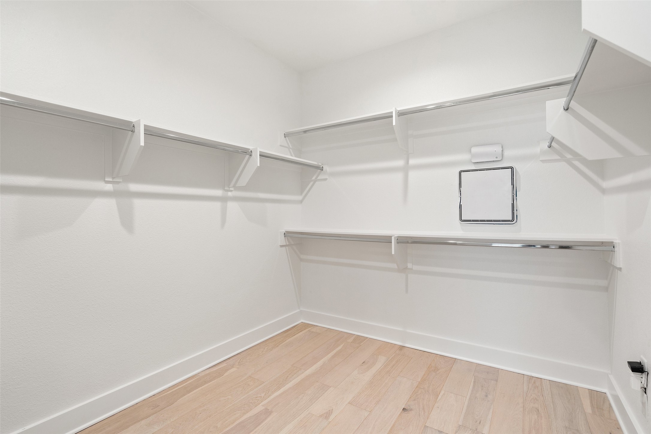 2805 McCurdy Street, Unit 6 Austin, TX 78723 - Photo 29 of 38 a view of a room with racks on the wall