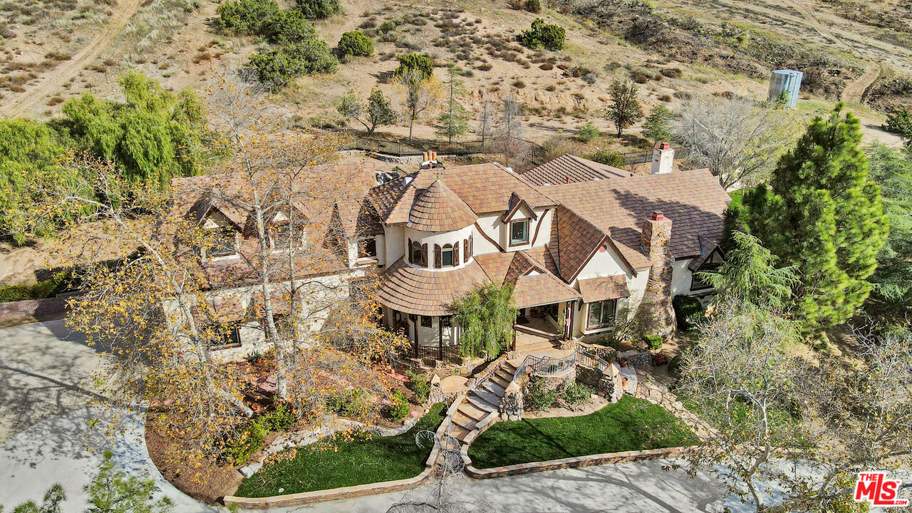 32140 Windrush Road Agua Dulce, CA 91390 - Photo 1 of 41 an aerial view of residential houses with outdoor space