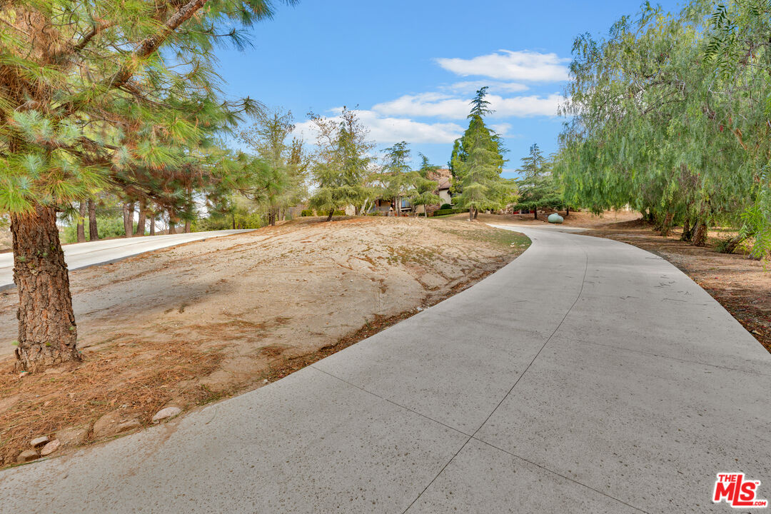32140 Windrush Road Agua Dulce, CA 91390 - Photo 35 of 41 a view of road and house in background