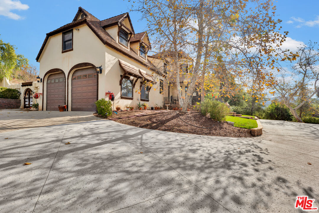 32140 Windrush Road Agua Dulce, CA 91390 - Photo 4 of 41 a house view with a outdoor space