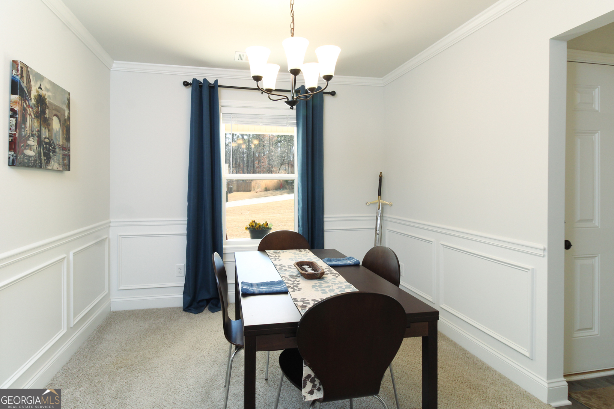 31 Rolling Woods Lane Colbert, GA 30628 - Photo 13 of 30 a view of a dining room with furniture and a chandelier
