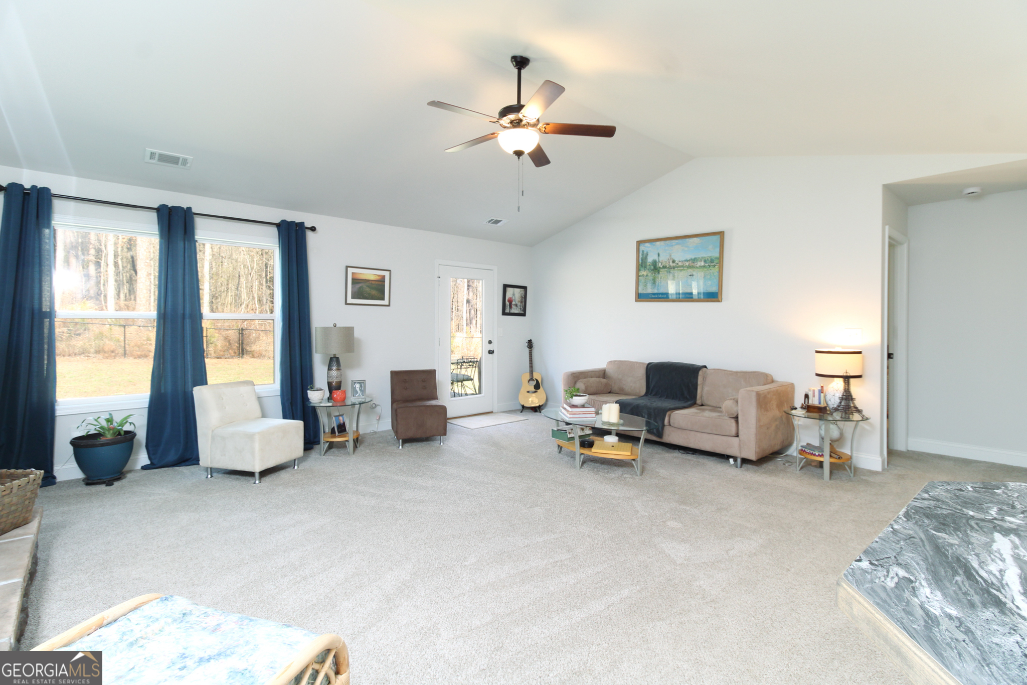 31 Rolling Woods Lane Colbert, GA 30628 - Photo 9 of 30 a living room with furniture and large windows