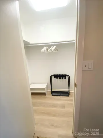 a view of a balcony with furniture