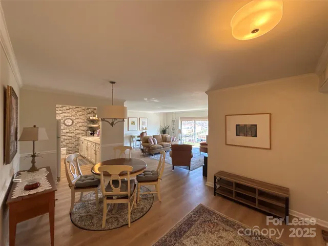 a kitchen with sink cabinets and stainless steel appliances
