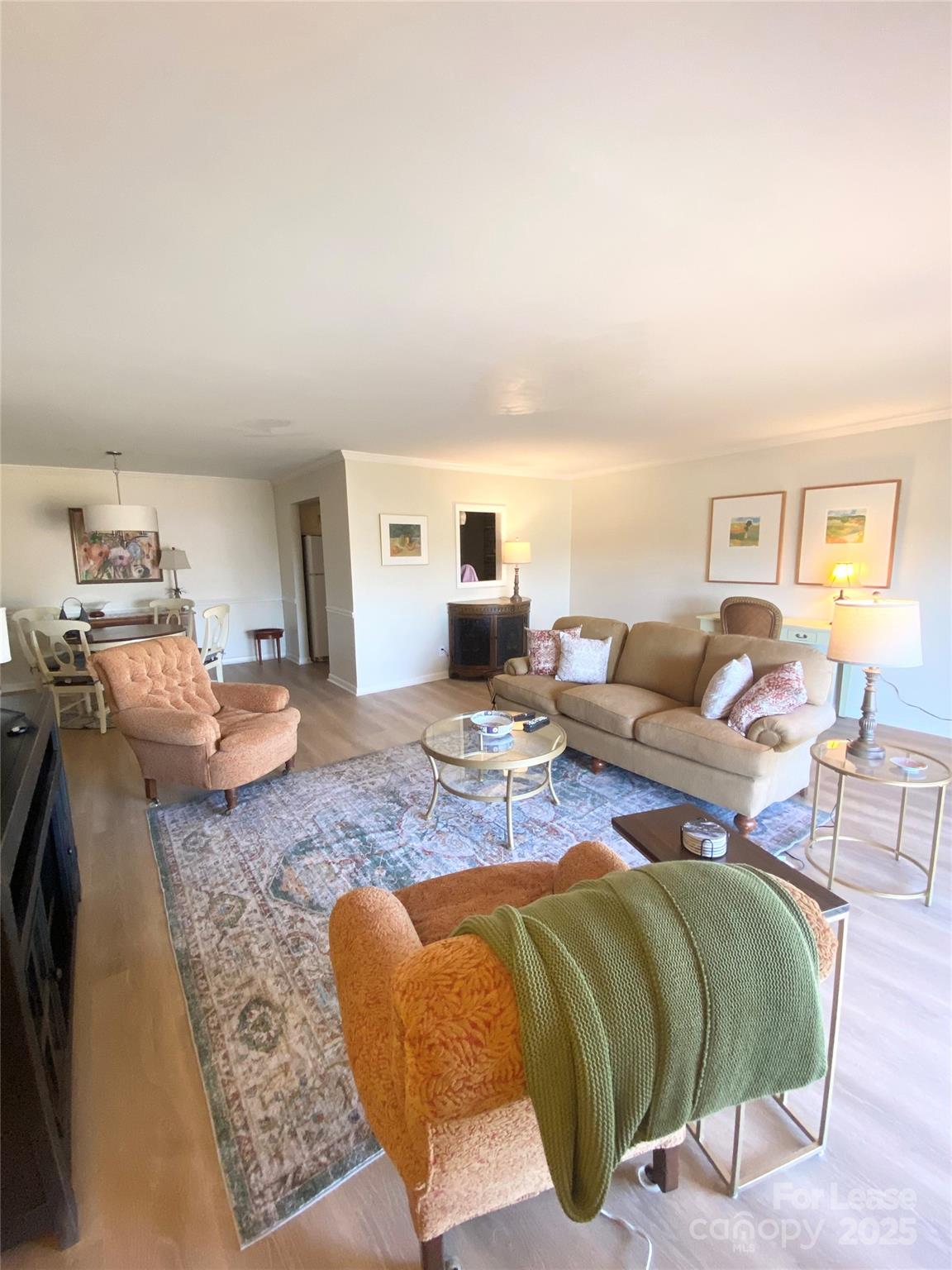 1323 Queens Road, Unit 322 Charlotte, NC 28207 - Photo 9 of 22 a living room with furniture and a couch