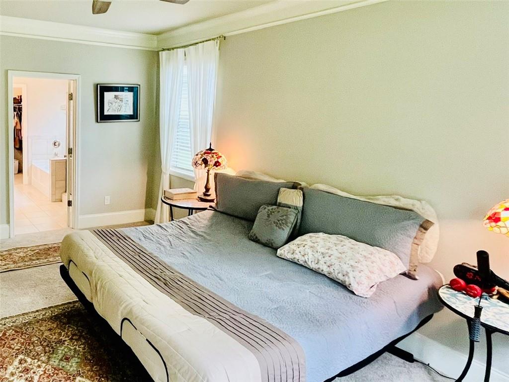 3015 Winding Ridge Waleska, GA 30183 - Photo 16 of 40 a bedroom with a bed and furniture