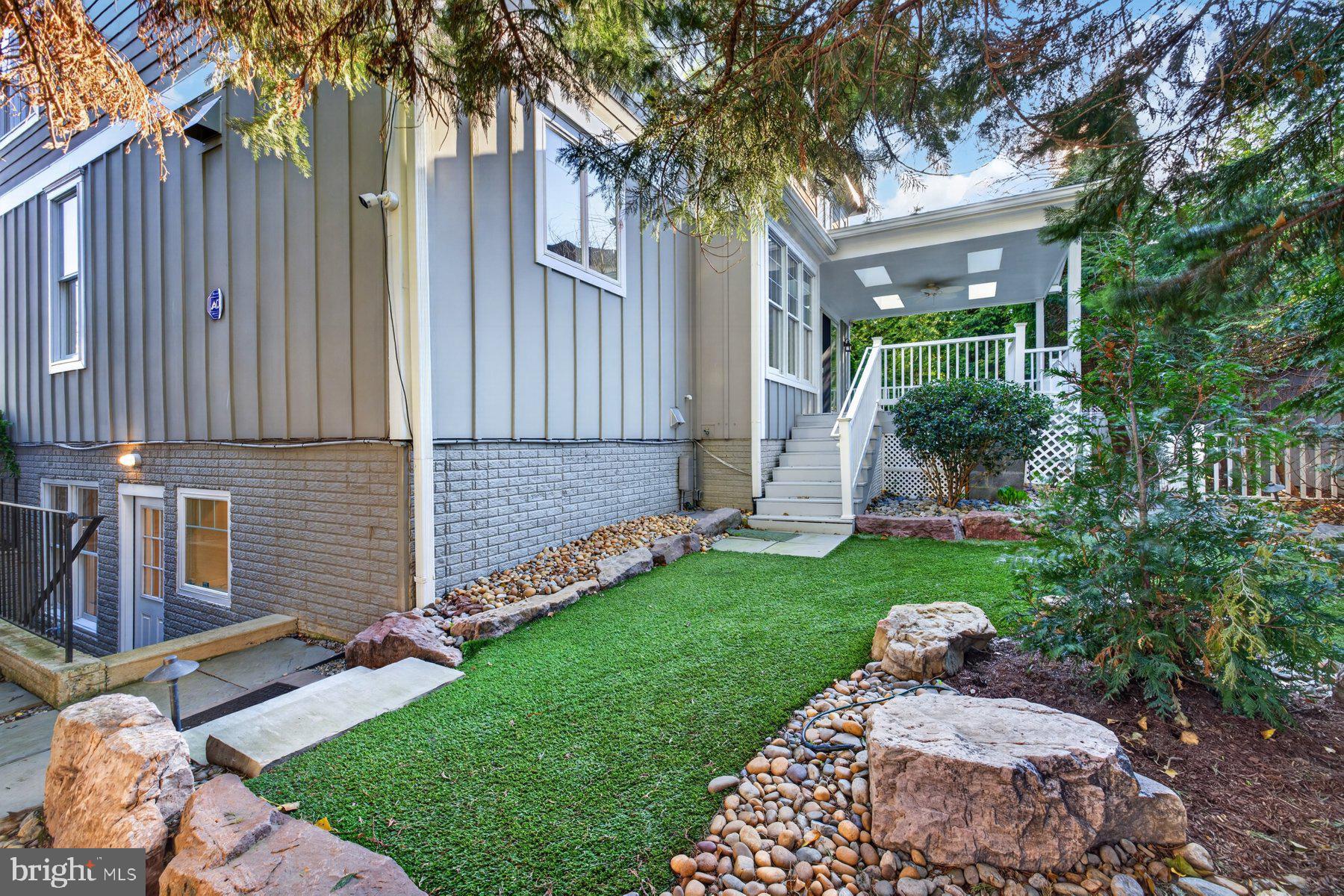 5011 Rugby Avenue Bethesda, MD 20814 - Photo 53 of 63 Turf and stone area of backyard
