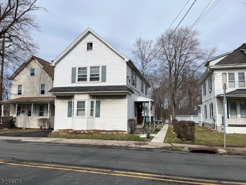 136 East Main Street, Unit 1 Little Falls, NJ 07424 - Photo 1 of 12 a view of white house
