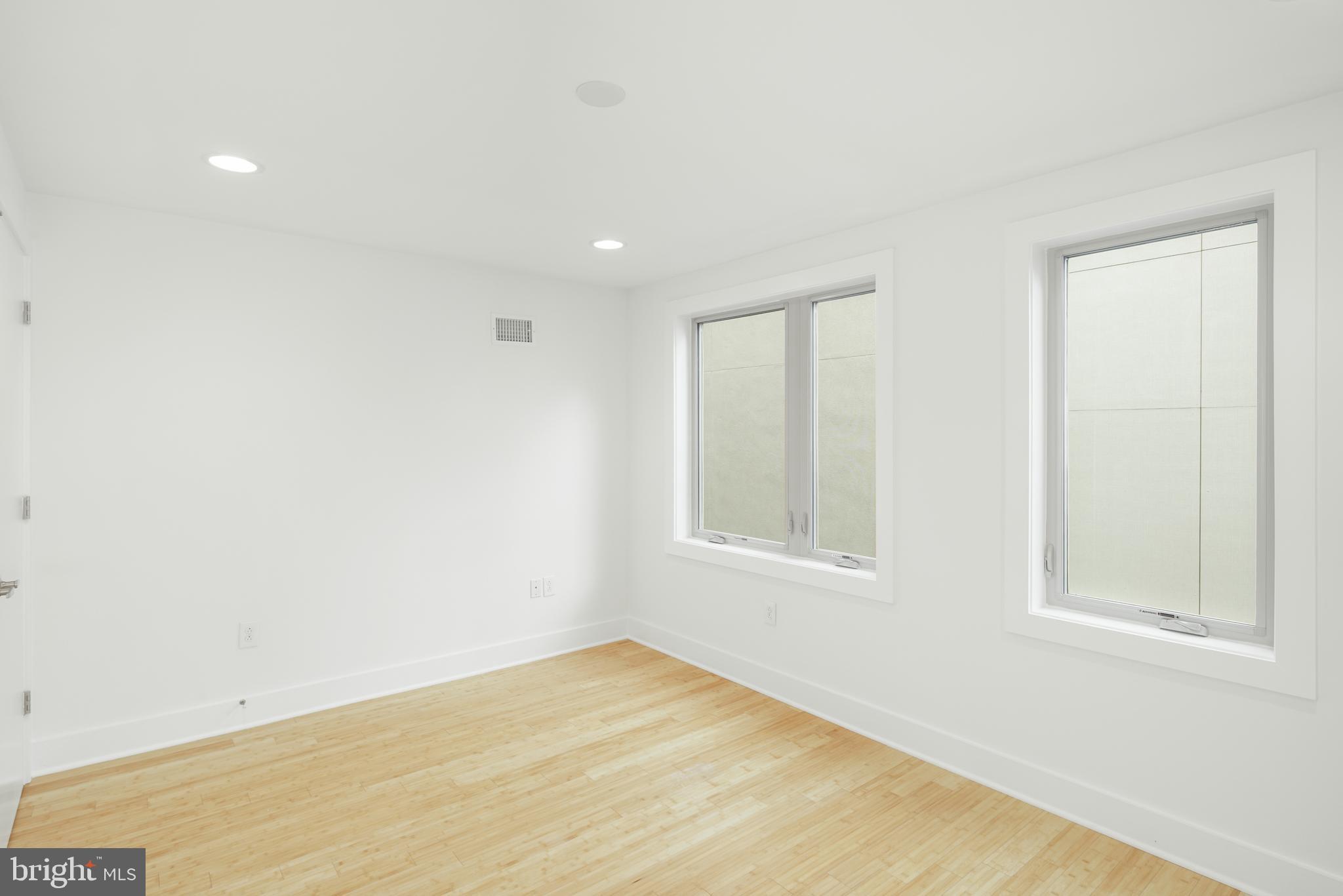 1135 Hope Street, Unit 18 Philadelphia, PA 19123 - Photo 18 of 21 an empty room with a window