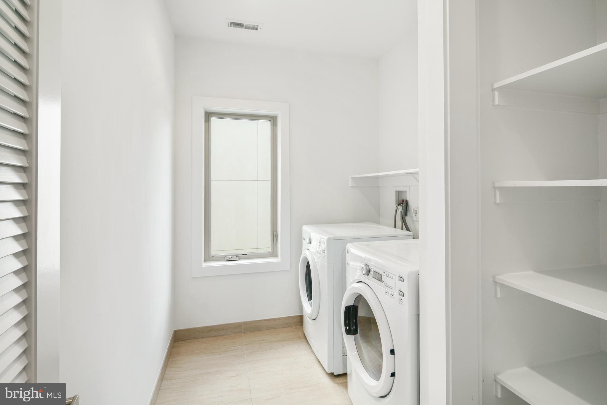 1135 Hope Street, Unit 18 Philadelphia, PA 19123 - Photo 20 of 21 a utility room with dryer and washer
