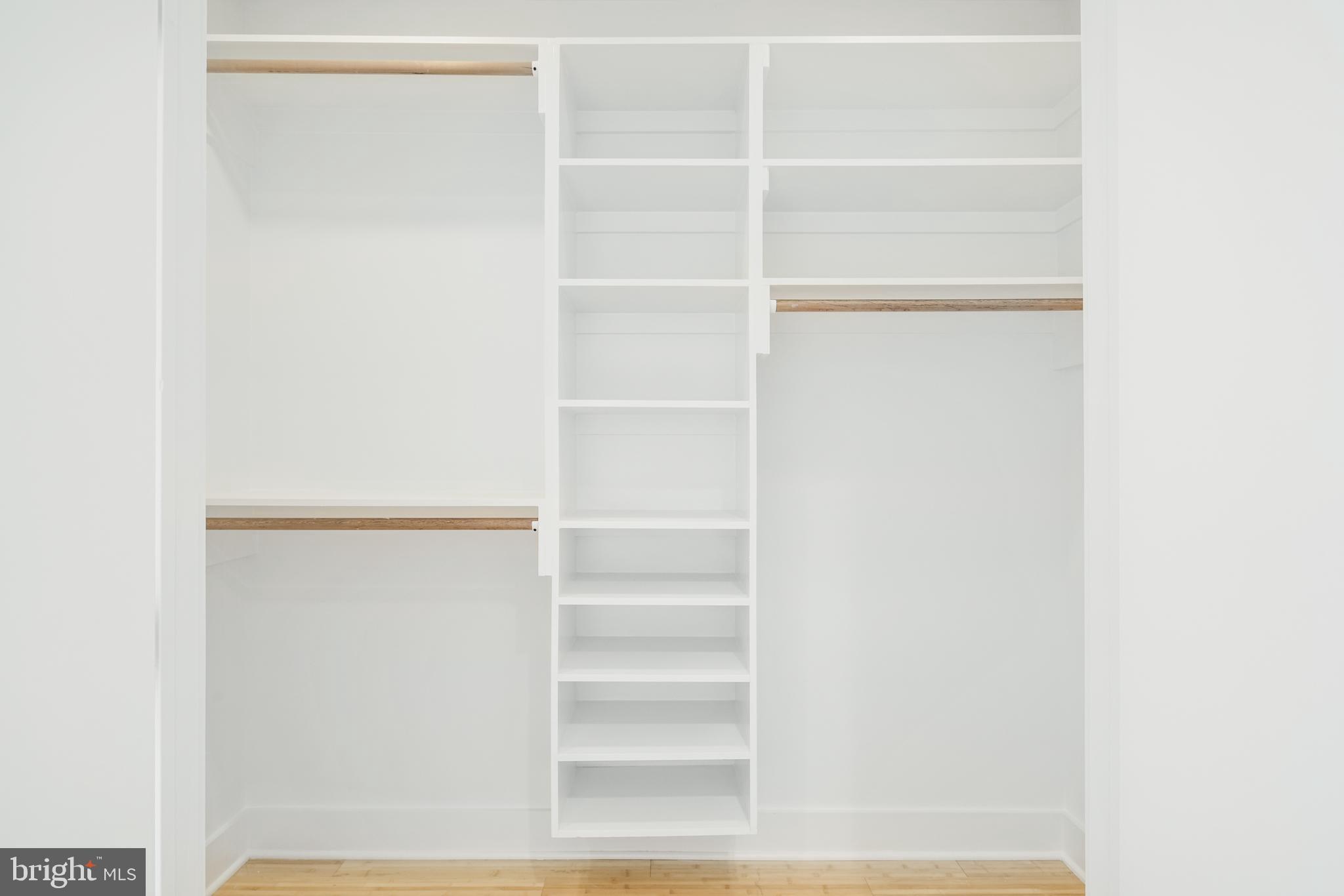 1135 Hope Street, Unit 18 Philadelphia, PA 19123 - Photo 9 of 21 a view of walk in closet with empty racks