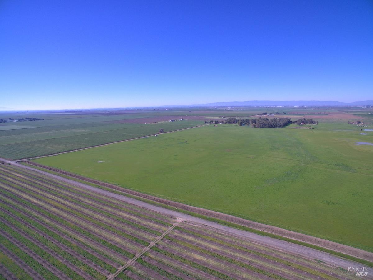 0 Hyde Road Dixon, CA 95620 - Photo 12 of 17 a view of a green field with clear sky