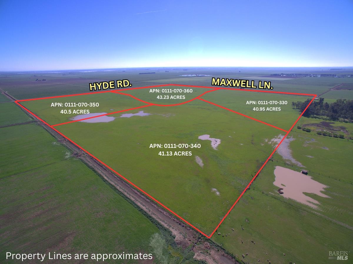 0 Hyde Road Dixon, CA 95620 - Photo 3 of 17 a sign that is sitting on a table and grass