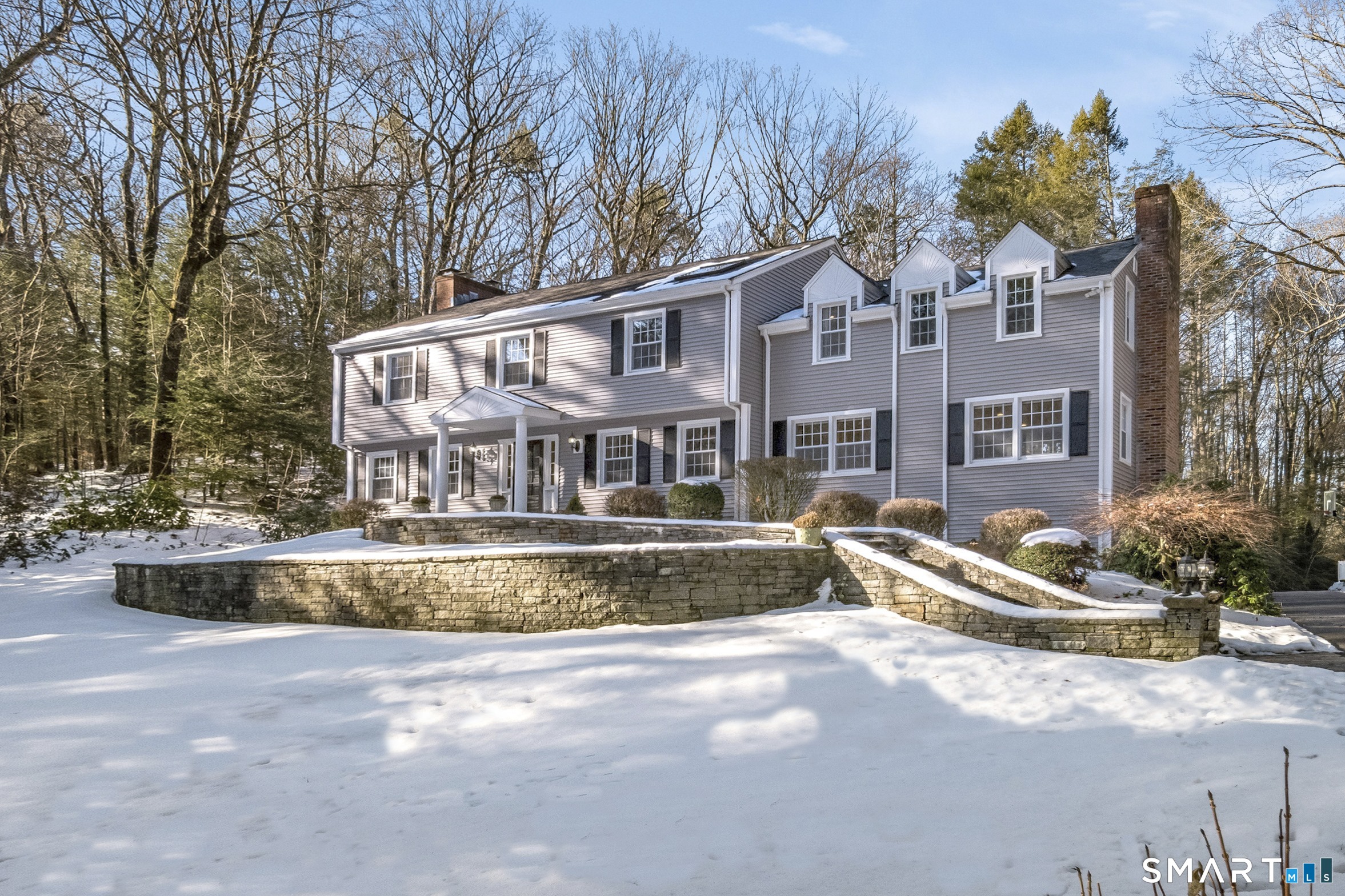 25 Lord Davis Lane Avon, CT 06001 - Photo 1 of 1 a front view of a house with a swimming pool