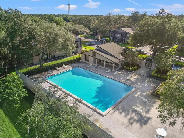 a car parked in front of brick building