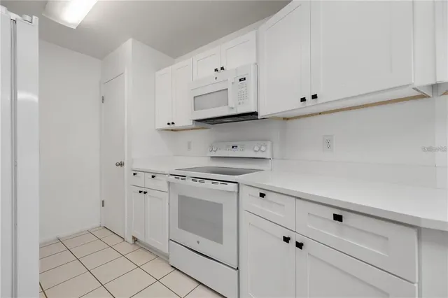 a view of a sink and a mirror