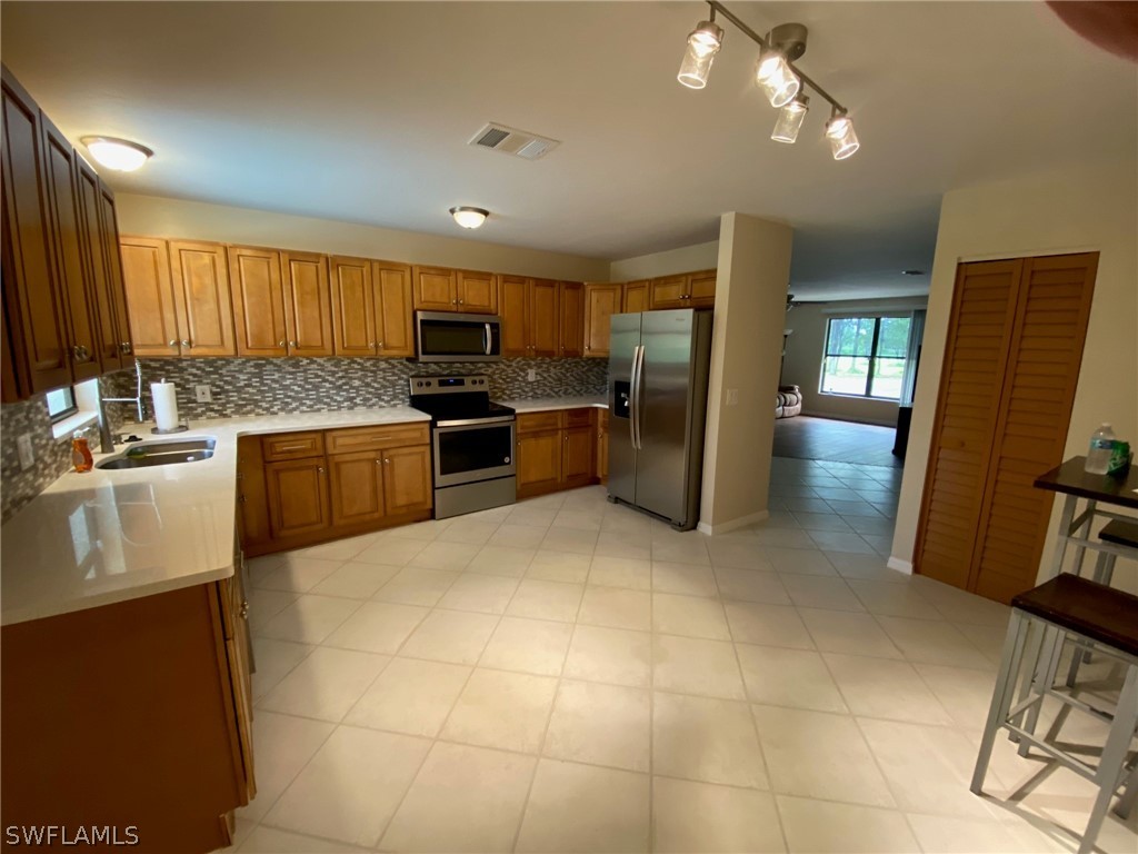1050 Auto Ranch Road Naples, FL 34114 - Photo 3 of 15 Gallery Image 3
