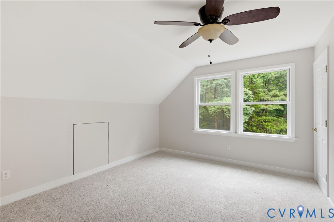 10152 Georgetown Road Mechanicsville, VA 23116 - Photo 25 of 35 an empty room with a window and a fan