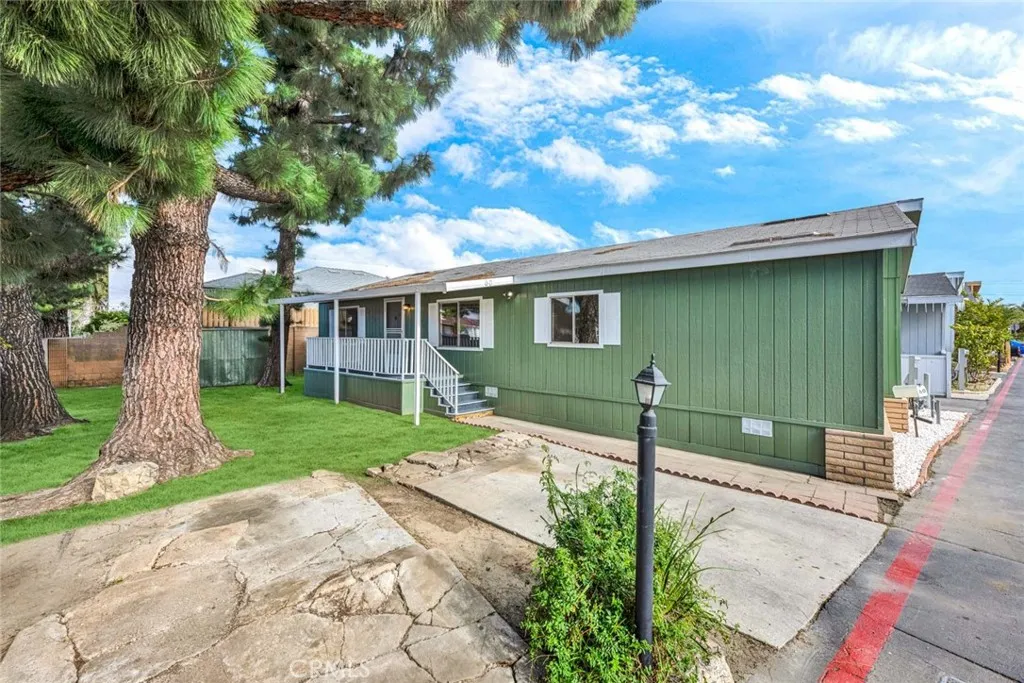 16600 Downey, Unit 60 Paramount, CA 90723 - Photo 1 of 1 Grass AI generated