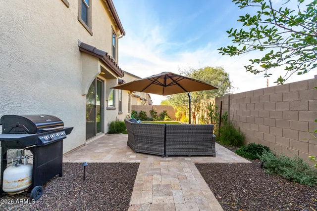 a house view with a backyard space