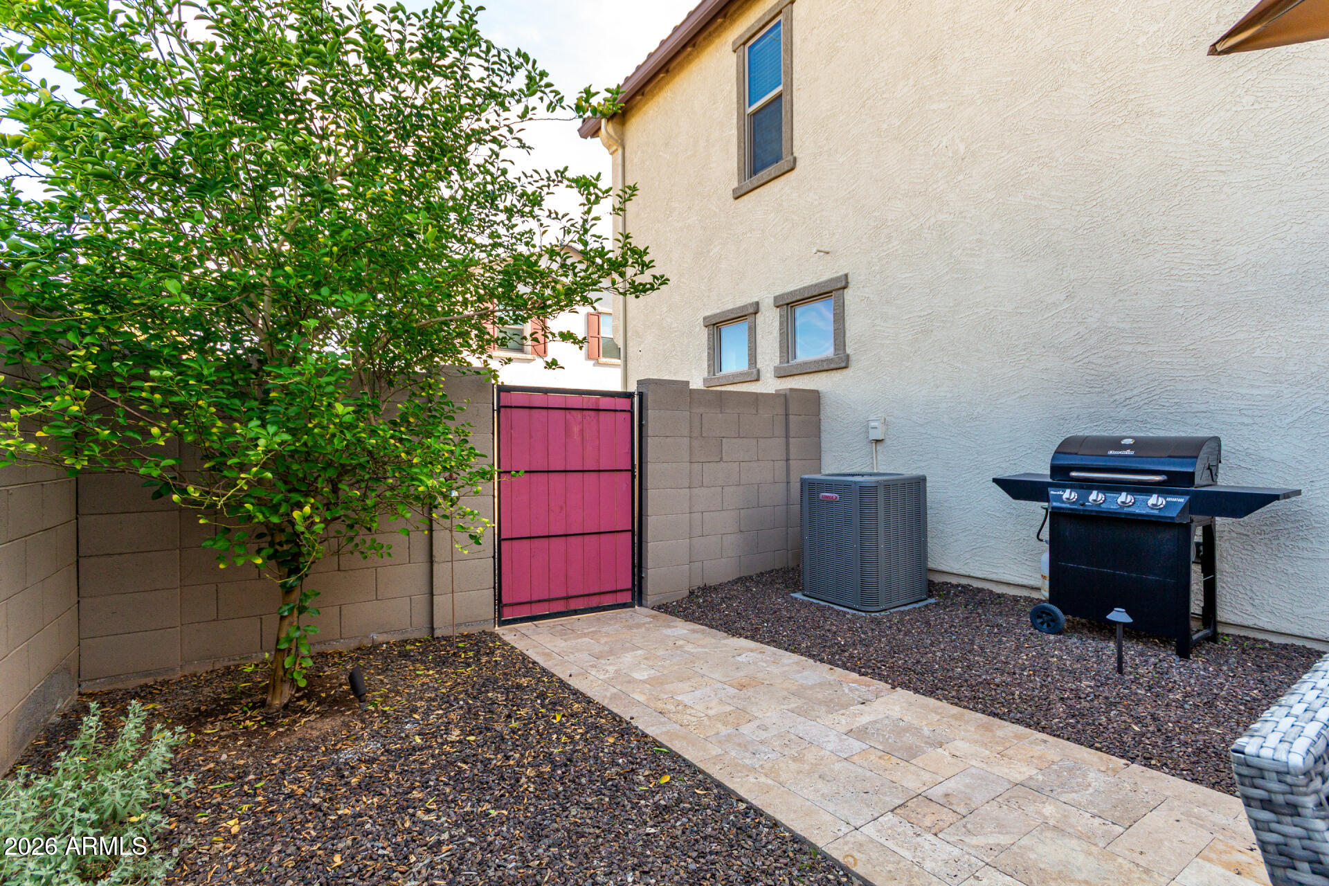 5740 West Raymond Street Phoenix, AZ 85043 - Photo 28 of 41 a house view with a backyard space