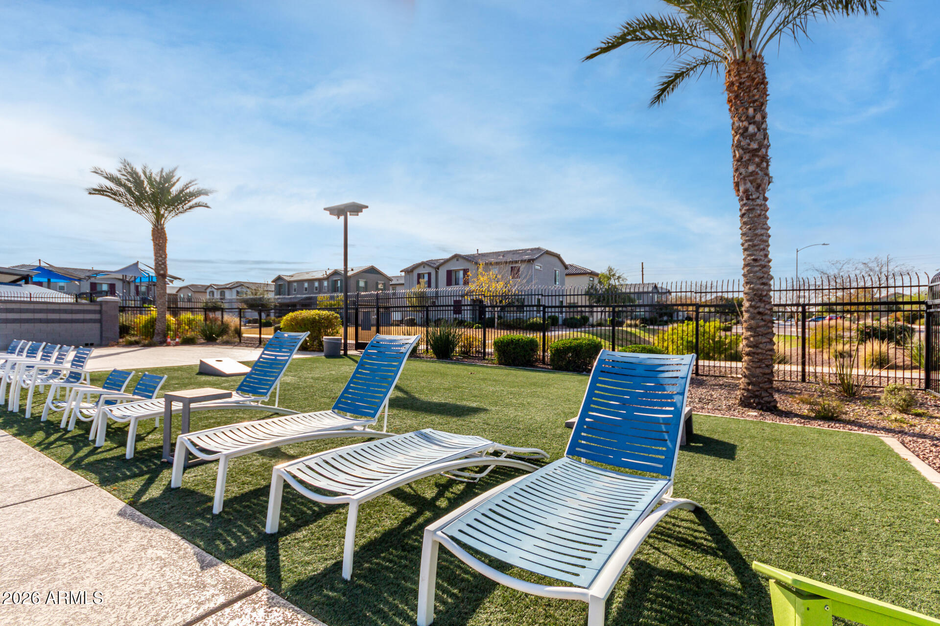 5740 West Raymond Street Phoenix, AZ 85043 - Photo 37 of 41 a view of a rooftop deck with couch and chairs