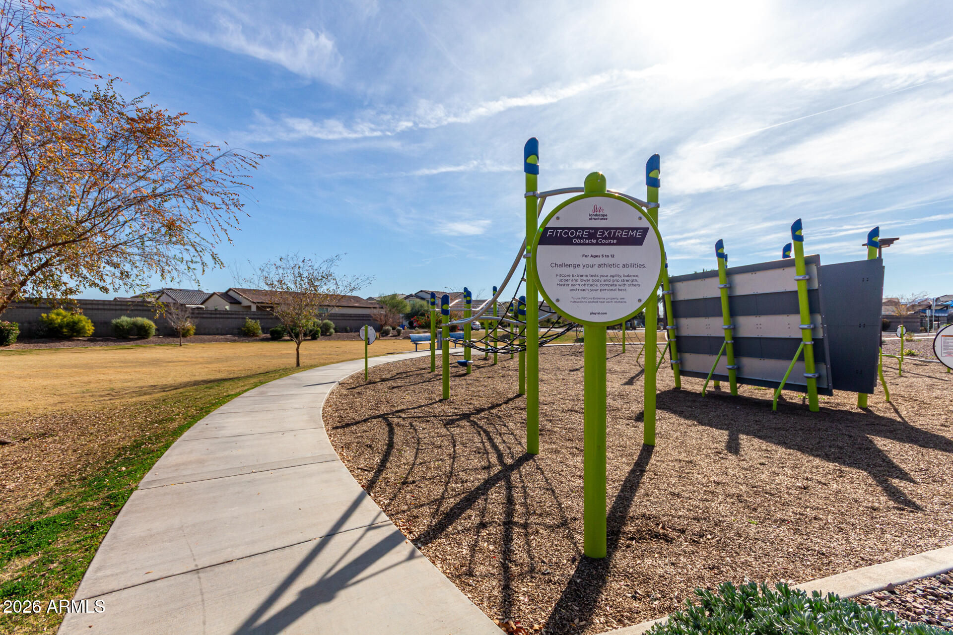 5740 West Raymond Street Phoenix, AZ 85043 - Photo 41 of 41 a view of swimming pool with sitting area and trees around