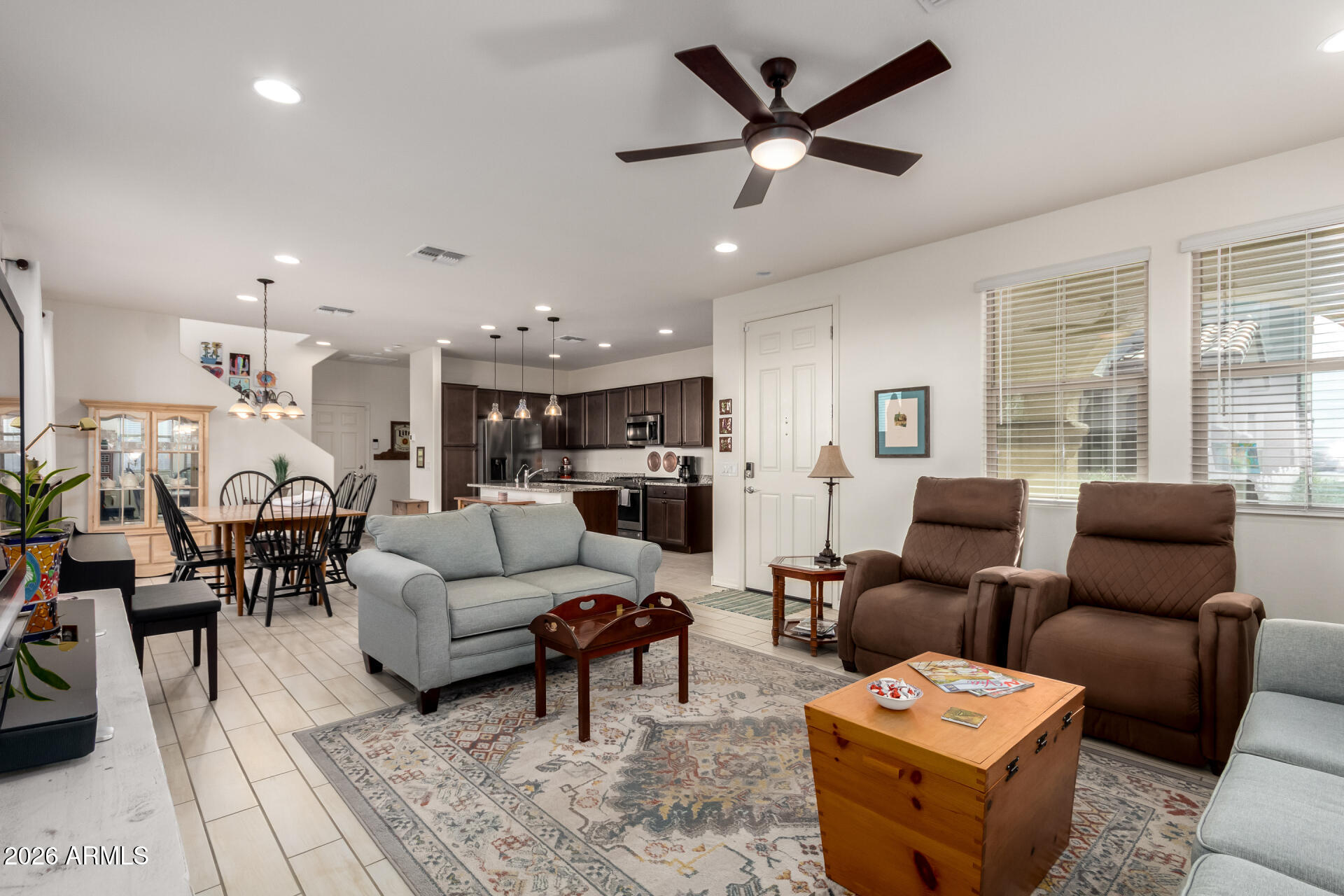5740 West Raymond Street Phoenix, AZ 85043 - Photo 5 of 41 a living room with furniture kitchen view and a window