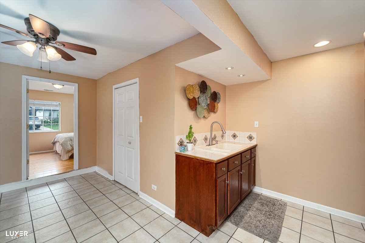 4448 Adele Lane Oak Forest, IL 60452 - Photo 15 of 28 a view of a hallway with bathroom