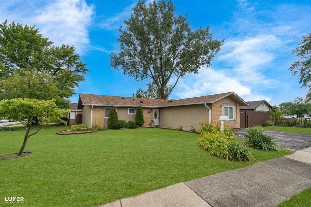 4448 Adele Lane Oak Forest, IL 60452 - Photo 2 of 28 a view of a house with a yard