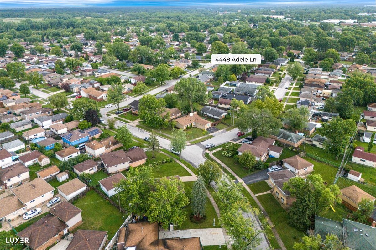 4448 Adele Lane Oak Forest, IL 60452 - Photo 28 of 28 an aerial view of residential houses with city view