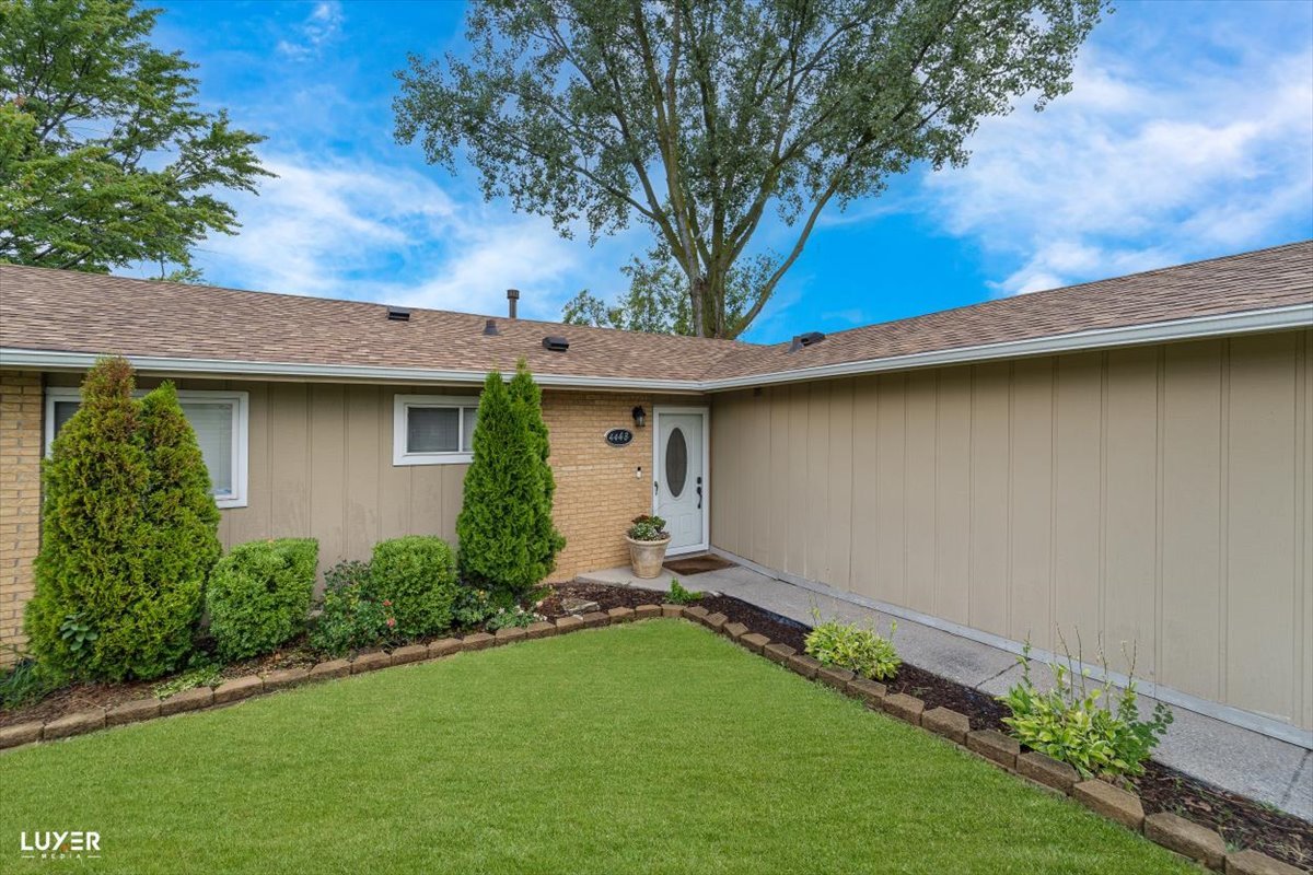 4448 Adele Lane Oak Forest, IL 60452 - Photo 3 of 28 a view of a backyard with a large tree