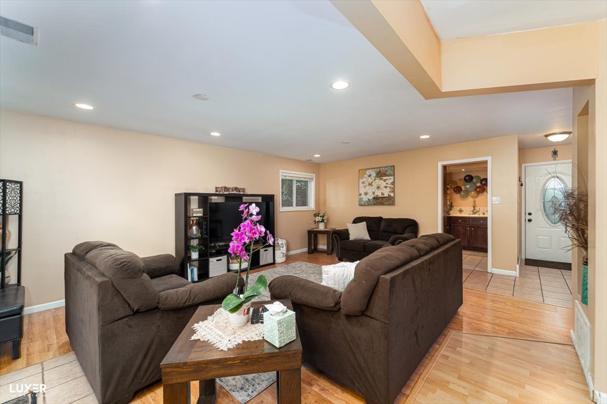 4448 Adele Lane Oak Forest, IL 60452 - Photo 9 of 28 a living room with furniture and a couch
