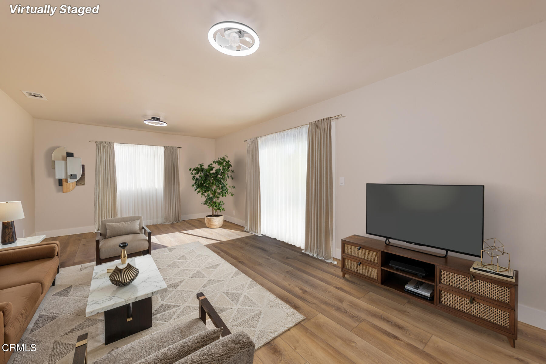 165 Burnham Road Oak View, CA 93022 - Photo 20 of 58 a living room with furniture and a flat screen tv