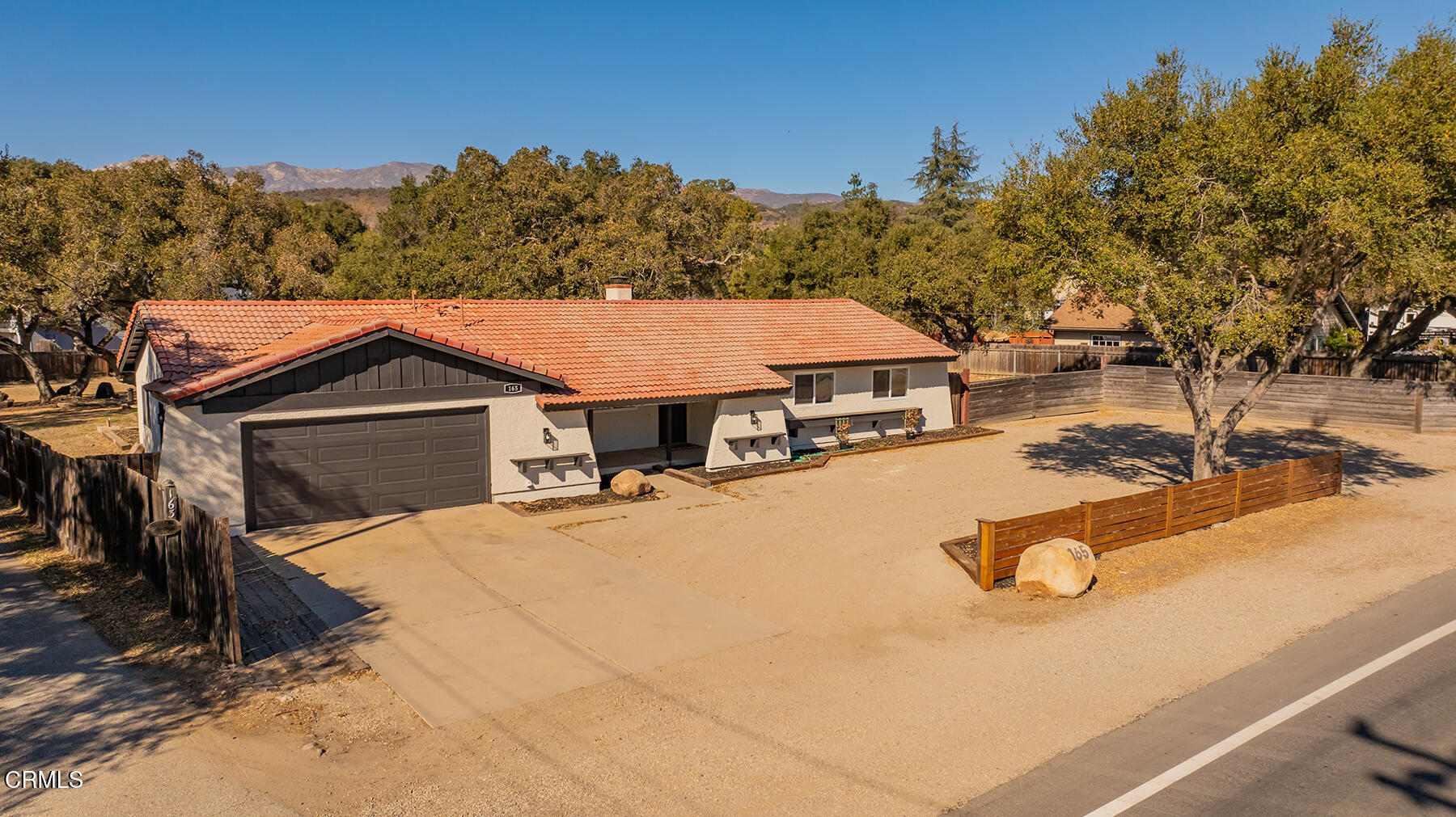 165 Burnham Road Oak View, CA 93022 - Photo 2 of 58 a view of house with yard and entertaining space