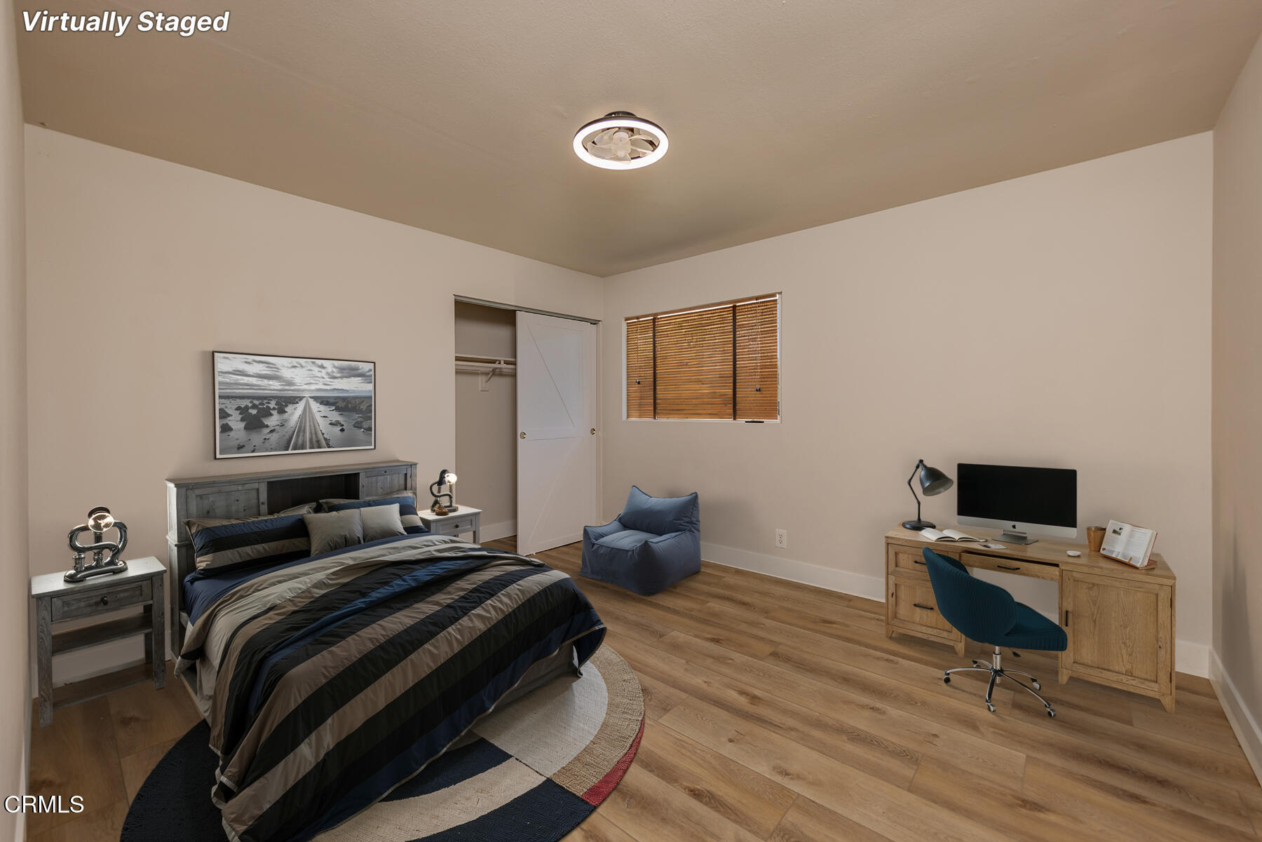 165 Burnham Road Oak View, CA 93022 - Photo 27 of 58 a bedroom with a bed and wooden floor