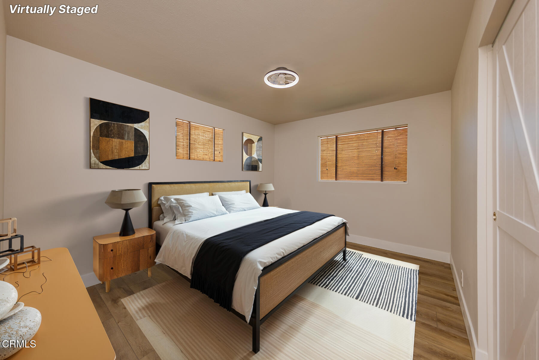 165 Burnham Road Oak View, CA 93022 - Photo 29 of 58 a bedroom with a bed and painting on the wall