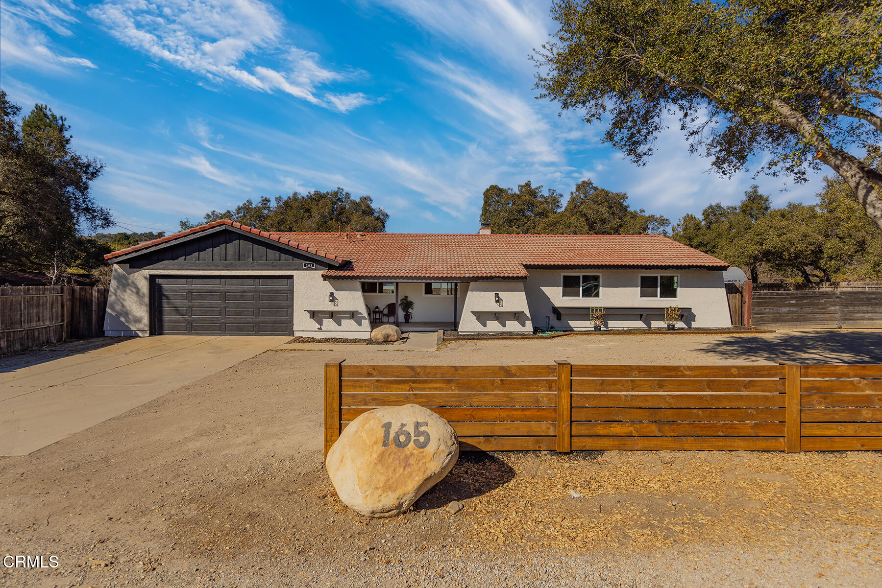 165 Burnham Road Oak View, CA 93022 - Photo 3 of 58 a front view of a house with a yard